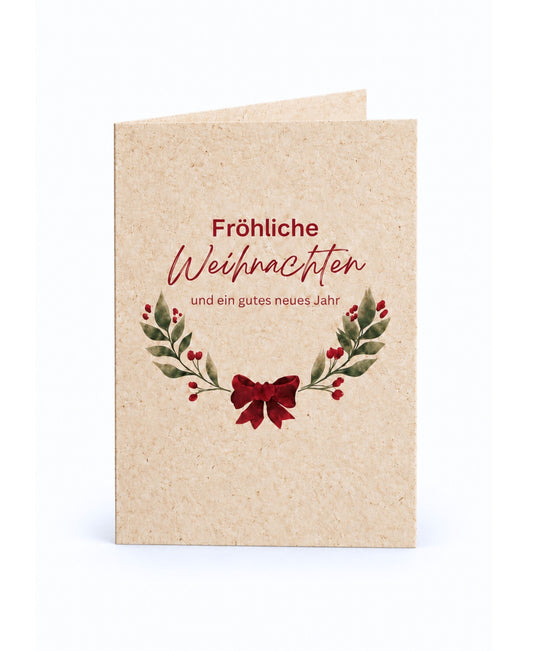 A6-Weihnachtskarte aus Graspapier „Fröhliche Weihnachten“ mit Aquarell in festlichen Farben