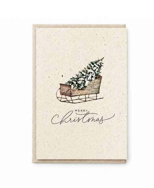Weihnachtskarte aus Graspapier – Tannenbaum & Schlitten